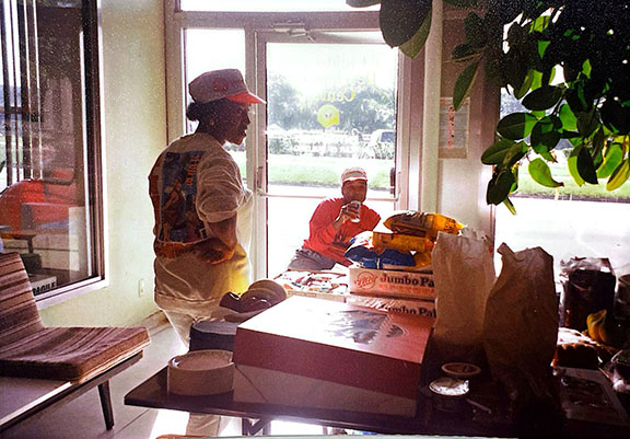 Two people in United Way hats at the Children's Development Center, 1990's