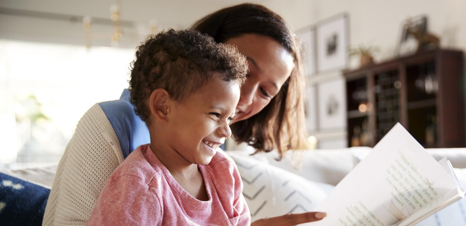 mother and child reading together